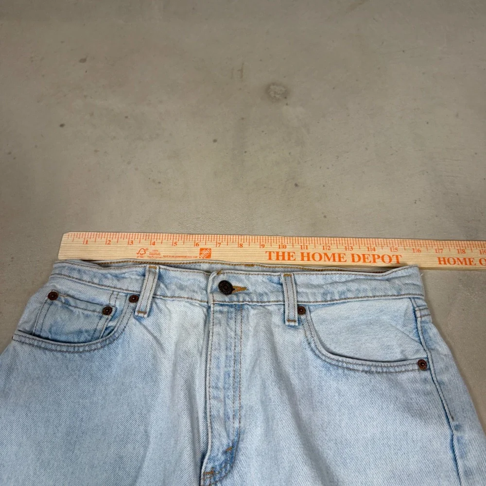 Vintage Levis 560 Light Wash Cut Off Denim Shorts Womens 13 Long Made in USA